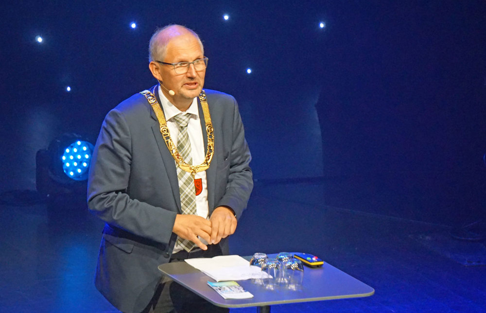 man at stage holding speach county mayor of Vestfold Telemark