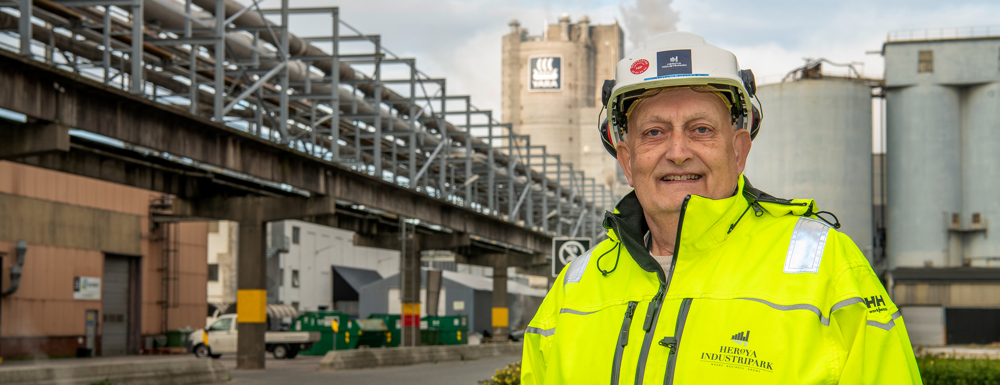 man, posing, industrial park, infrastructure, concrete buildings